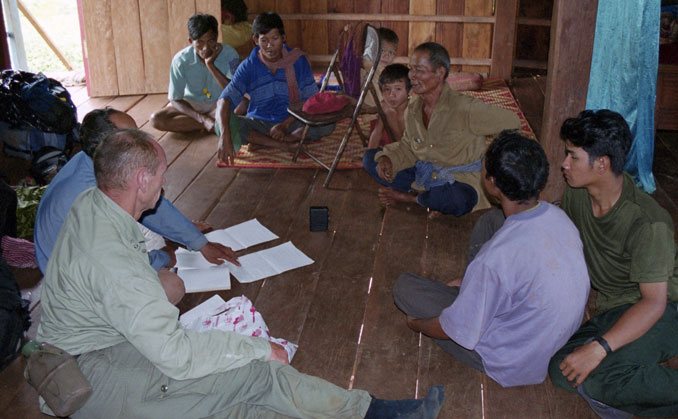 Vogel and Nchööp interviewing one of the last surviving elephant tamers.
